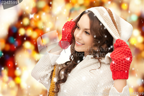 Image of beautiful woman in white sweater
