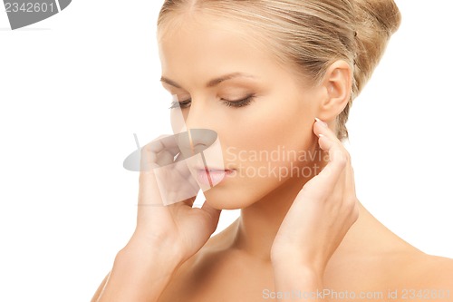 Image of face and hands of beautiful woman