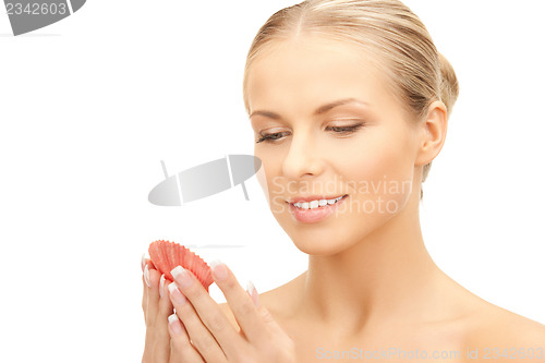 Image of beautiful woman with seashell