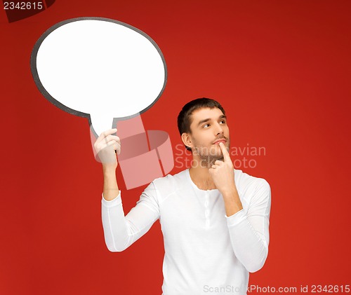 Image of pensive man with blank text bubble