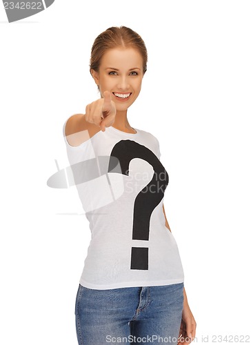 Image of happy and smiling woman pointing her finger