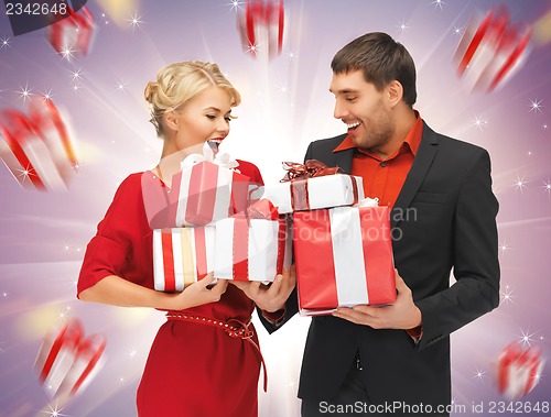 Image of man and woman with gift boxes