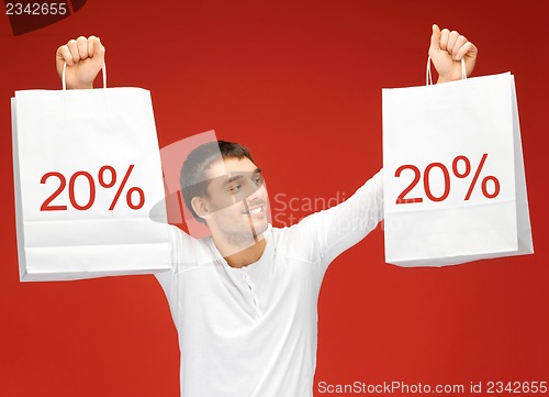 Image of man with shopping bags