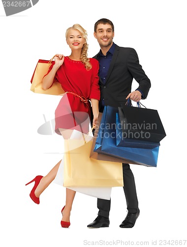 Image of man and woman with shopping bags