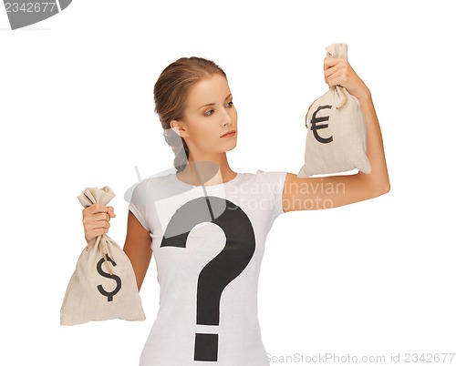 Image of woman with dollar and euro signed bags