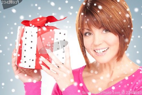 Image of happy woman with gift box