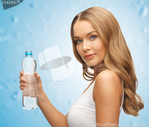 Image of young beautiful woman with  bottle of water