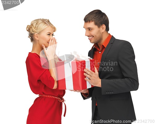 Image of man and woman with present