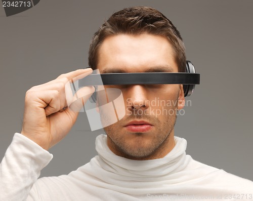 Image of man with futuristic glasses