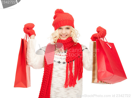 Image of young girl with shopping bags