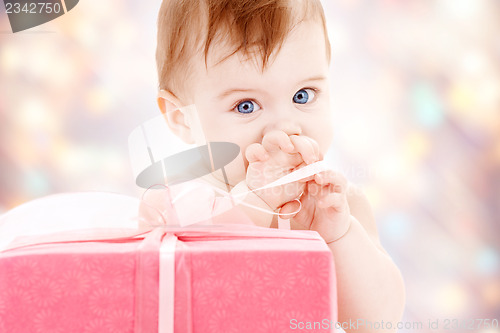 Image of baby boy with gift box