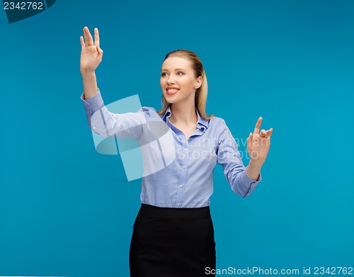 Image of woman working with something imaginary