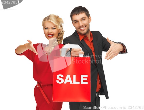 Image of man and woman with shopping bag