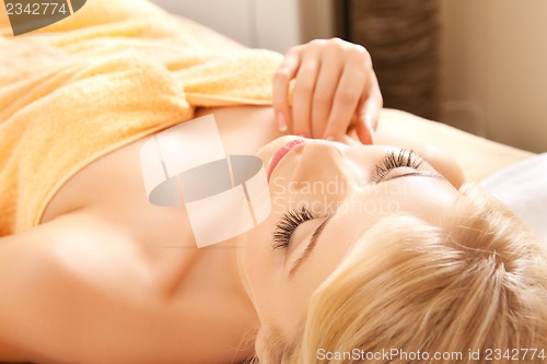 Image of beautiful woman in spa salon