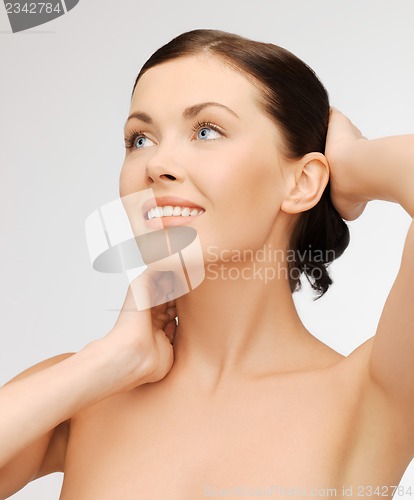 Image of face and hands of beautiful woman