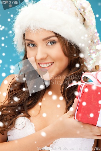 Image of santa helper girl with gift box