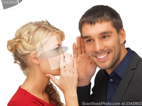 Image of man and woman spreading gossip