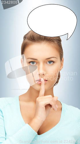 Image of finger on lips