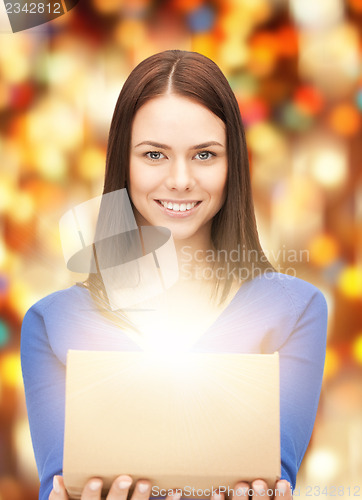 Image of happy woman with gift box