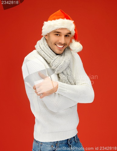 Image of handsome man in christmas hat