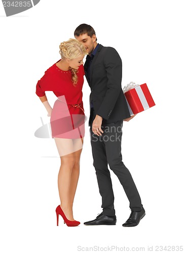 Image of man and woman with present