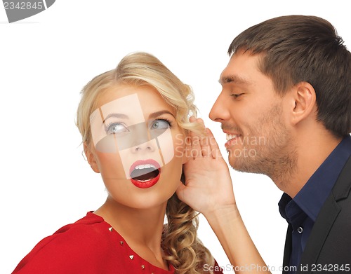 Image of man and woman spreading gossip