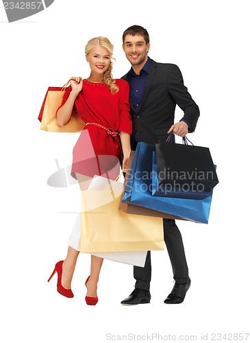 Image of man and woman with shopping bags