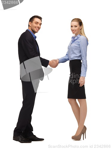 Image of man and woman shaking their hands