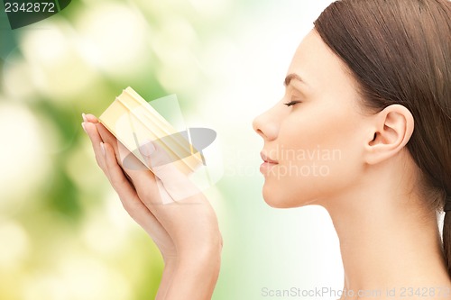 Image of beautiful woman with moisturizing creme