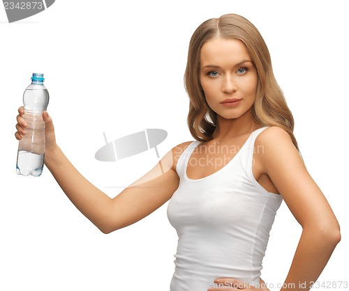 Image of young beautiful woman with  bottle of water