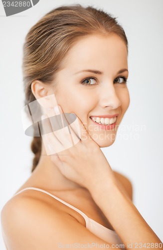 Image of face and hands of beautiful woman