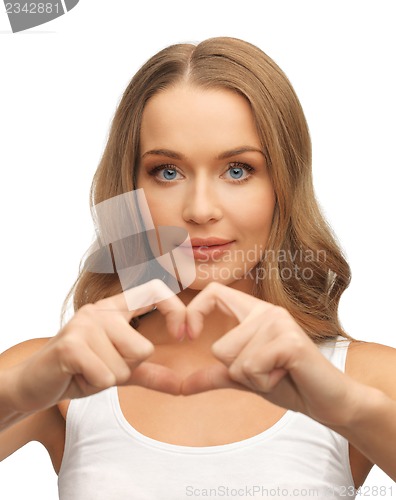 Image of woman forming heart shape