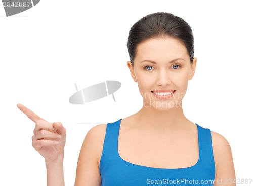 Image of beautiful woman pointing her finger