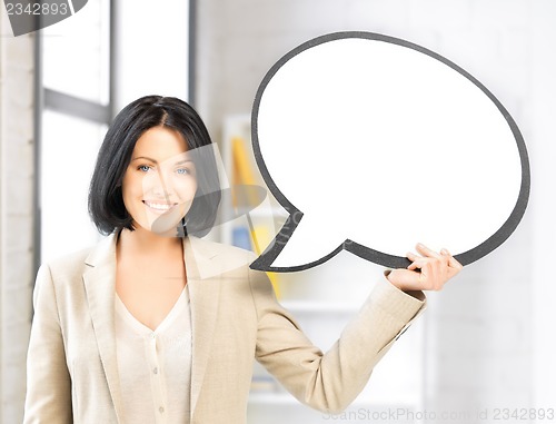 Image of smiling businesswoman with blank text bubble