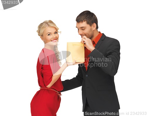 Image of man and woman with present