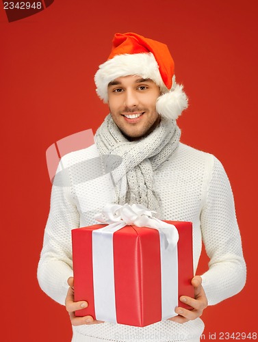 Image of handsome man in christmas hat