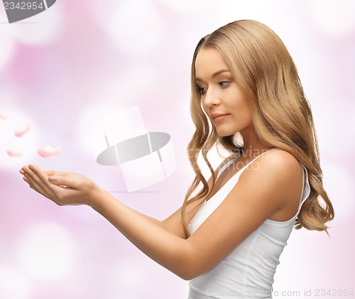 Image of woman holding something on the palms