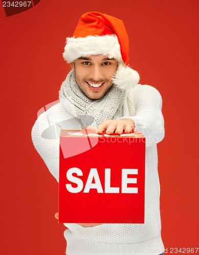 Image of handsome man in christmas hat