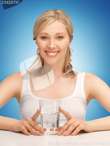 Image of woman with glass of water