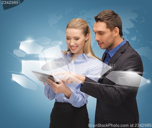 Image of man and woman with virtual screens