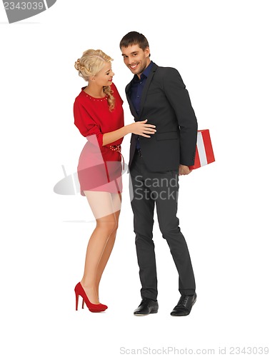 Image of man and woman with present
