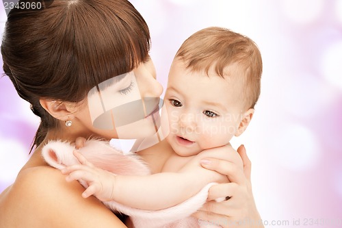 Image of happy mother with adorable baby