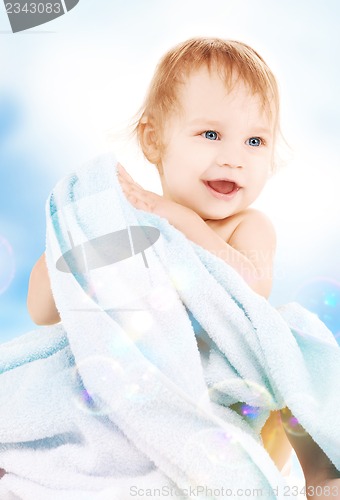 Image of baby with blue towel