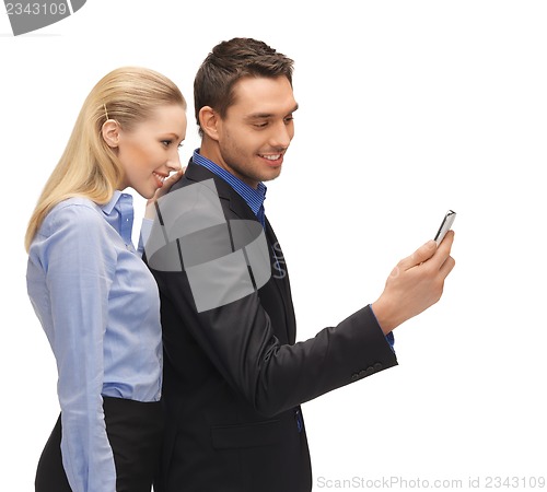 Image of man and woman reading sms