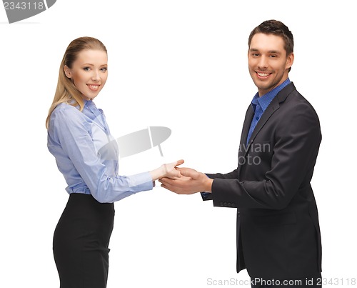 Image of man and woman showing something on the palms