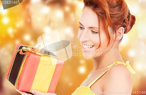 Image of happy woman with gift box