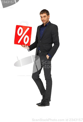 Image of handsome man in suit with percent sign