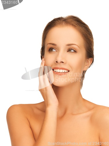 Image of face and hands of beautiful woman