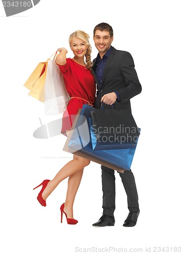 Image of man and woman with shopping bags