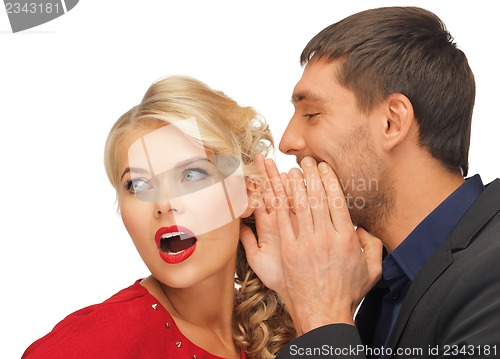 Image of man and woman spreading gossip